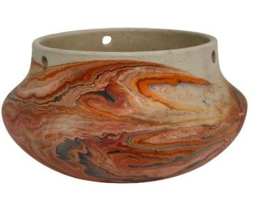 A Nemadji Pottery. A Nemadji pottery with multi color decorative surface. A unique Nemadji 