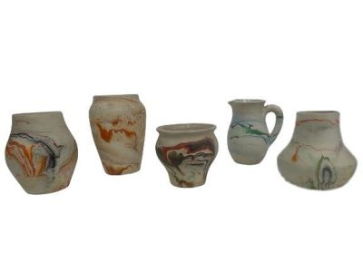 A group of five Nemadji Pottery with multi color decorative surface. A unique Nemadji Pottery 