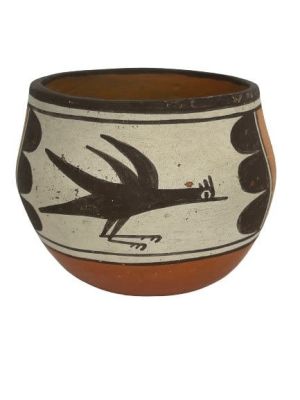 A polychrome Native American small pot measuring 4 inches in diameter. A unique pottery with 