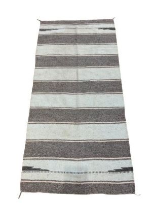 A NAVAJO WEAVING HAND WOVEN FLAT TRIBAL BLANKET RUG. A unique tribal weaving with multiple rows 