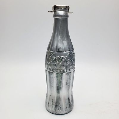 After Andy Warhol, Silvered Coca-Cola Bottle. After Andy Warhol, American (1928-1987) Silvered 
