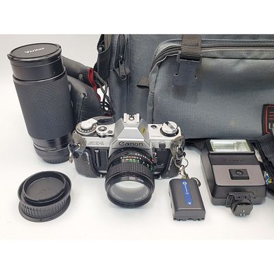 Vintage Canon AE-1 35mm Camera w/ 1 Other Lens. Vintage Canon AE-1 35mm SLR Film Camera Along w/ 