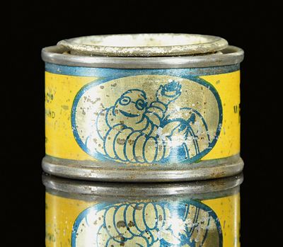 MICHELIN "FOCALIS" (1-2). Small tin can, lithographed, with depiction of a smoking Bibendum, F 
