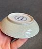 A FINE CHINESE INCISED CELADON-GLAZED DISH, YONGZHENG MARKS 
12 CM DIAMETER 
2.5 CM HIGH 
GOOD Image - 2