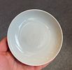 A FINE CHINESE INCISED CELADON-GLAZED DISH, YONGZHENG MARKS 
12 CM DIAMETER 
2.5 CM HIGH 
GOOD Image - 3