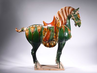 TANG SANCAI GREEN GLAZED HORSE AND SADDLE FIGURINES. Name TANG SANCAI GREEN GLAZED HORSE AND 