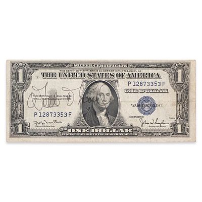 WALT DISNEY SIGNED 1935 U.S. ONE DOLLAR SILVER CERTIFICATE. 6 1/8 x 2 1/2 in (15.5 x 6.5 cm) 