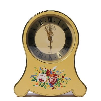 JAEGER-LECOULTRE PAINTED YELLOW MANTEL CLOCK. length: 4 5/16 in (11 cm); height: 4 15/16 in 