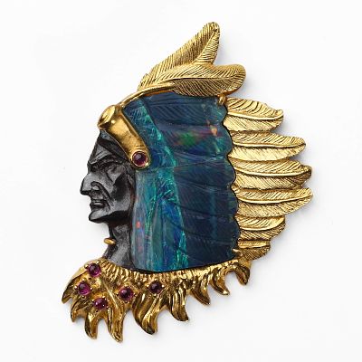 AN OPAL AND 18K GOLD BROOCH, "KING OF THE INDIANS". Dimensions Length: 1 7/8 in. (48 mm); Width: 