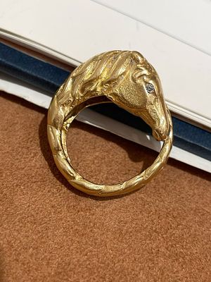 HERMES 18K GOLD HORSE HEAD RING. This Hermes horse's head ring is French elegance hidden in 