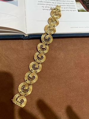 18K GOLD LALAOUNIS SPIRAL BRACELET. From the foot of the Acropolis of Athens, Greece, the 