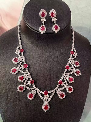 PIGEON BLOOD BURMESE RUBY DIAMOND NECKLACE EARRING SET. Necklace 49.6g, chain length 39cm 