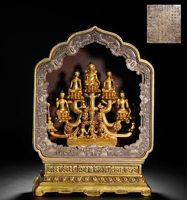 A GILDED BRONZE NICHES OF SAKYAMUNI BUDDHA AND HIS ATTENDANTS FROM THE QIANLONG PERIOD OF THE QING. 