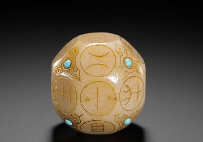 A TWELVE-SIDED DIVINATION DICE OF JADE INLAID WITH GOLD AND TURQUOISE FROM THE HAN DYNASTY. H:4.6 