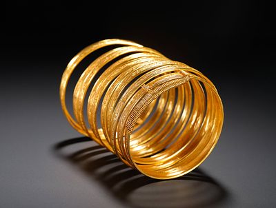 GILDED BRONZE NINE-RING ENGRAVED BRACELET OF THE QING DYNASTY. DIAMETER:7.2CM (2.83IN) 