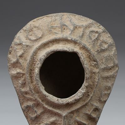 Byzantine oil lamp with inscription 'The light of Christ shines for all'. ITEM: Oil lamp with 