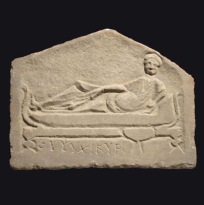Funerary stele depicting a symposium with Greek inscription ‘Cheer up, Kyris’, PUBLISHED. ITEM: 