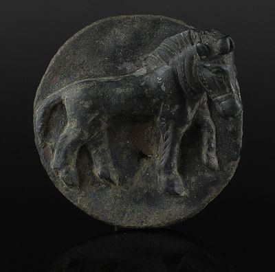 Roman military phalera depicting a standing horse. ITEM: Military phalera depicting a standing 