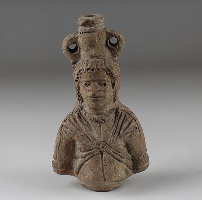 Roman flask in the form of a bust of a Nubian. ITEM: Flask in the form of a bust of a Nubian 