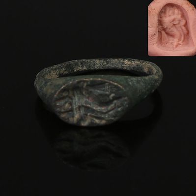 Greek ring depicting a cornucopia. ITEM: Ring depicting a cornucopia MATERIAL: Bronze 