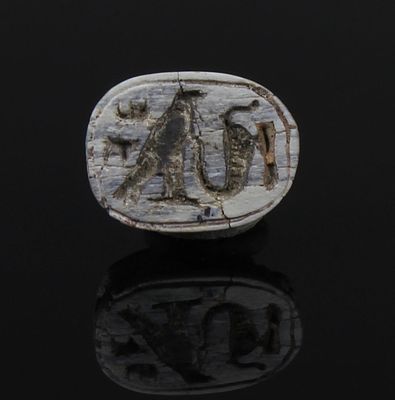 Egyptian scarab with falcon, uraeus, men-sign (Amun-Re). ITEM: Scarab with falcon, uraeus 