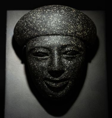 Egyptian sarcophagus mask, Ex Maurice Nahman. ITEM: Sarcophagus mask depicting a youthful face 