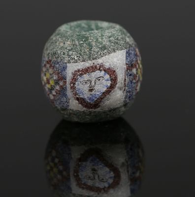 Romano-Egyptian face bead, probably Medusa. ITEM: Face bead, probably Medusa MATERIAL: 
