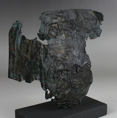 Roman military mask helmet section depicting Mars. ITEM: Military mask helmet section 