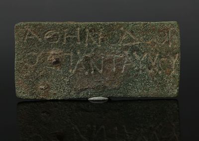 Roman plaque with inscription, probably 'Athenodorus Omnipresent'. ITEM: Plaque with 