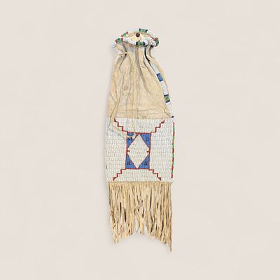 Plains (Sioux) Beaded Pipe Bag. Circa 1890-1910, measuring approx 22.5 inches in length x 7.5 