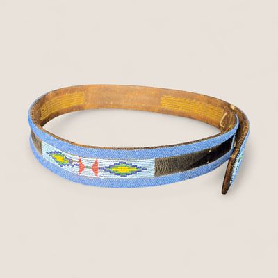 Beaded Crow Belt. Measuring 32 inches in length x 1.5 inches wide, with blue, red and yellow 