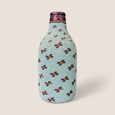 Paiute Beaded Native American Bottle. With blue and orange beads, measuring approx 6 inches tall.