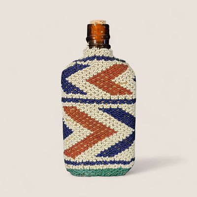 Excellent Beaded Paiute Beaded Bottle/Flask. With green, white, red, and blue beads, measuring 