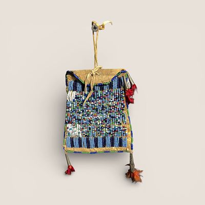 Plains Native American Strike-a-Lite. Measuring approx 5 x 3.5 inches, with scattered colored 