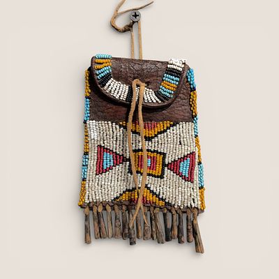 Excellent Southern Beaded Strike-a-Lite. This 19th-century Plains strike-a-lite is a compelling 