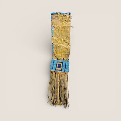 Plains Beaded & Ochred Pipe Bag. Circa 19th century, measuring a petite 27 inches in length x 