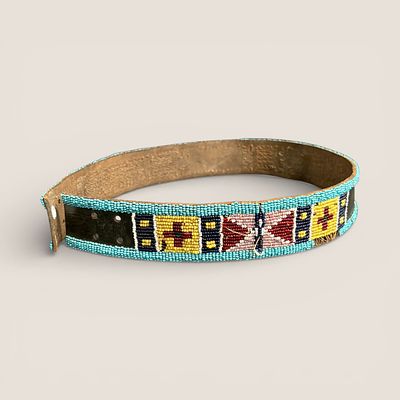 Beaded Crow Belt With Flag Motifs. Measuring approx 29.5 inches in length x 1 3/4 inches wide 