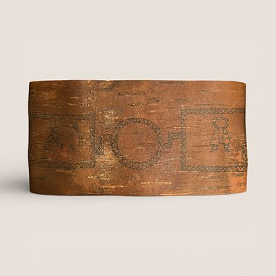 Incised Birchbark Memory Scroll. Circa 1900, Chippewa. Measuring approx 9 x 4 inches. To bid 