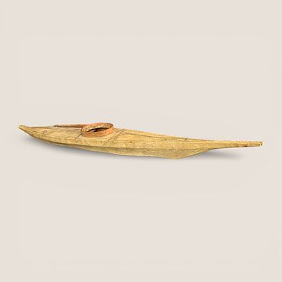 Early Inuit Seal Skin Model Canoe. Measuring 16.5 inches in length with a great patina. Sinew 