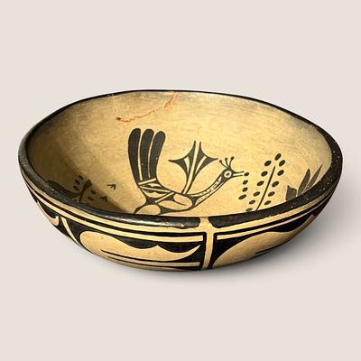 Santo Domingo Pottery Bowl. Measuring approx 10 x 4 inches, with a broken piece to rim that has 