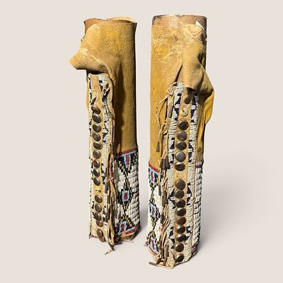 19th C Cheyenne Beaded Leggings. An exceptional pair of Cheyenne beaded leggings constructed of 