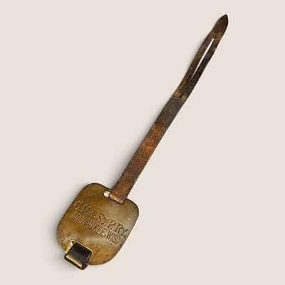 Antique Brass " C.M. & St. P. Ry. " Milwaukee Wis. Baggage Check Tag. Antique Brass "C.M .&amp; 