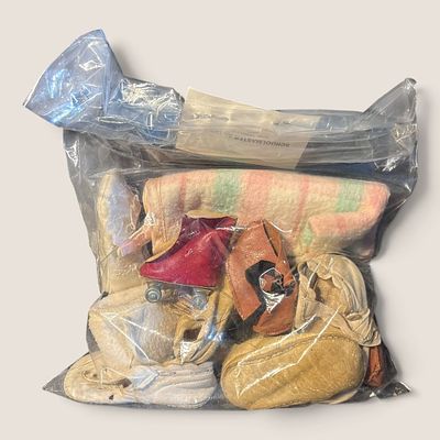 Bag Of Vintage Baby And Doll Shoes Etc. Bag of vintage baby and doll shoes and misc.We offer 