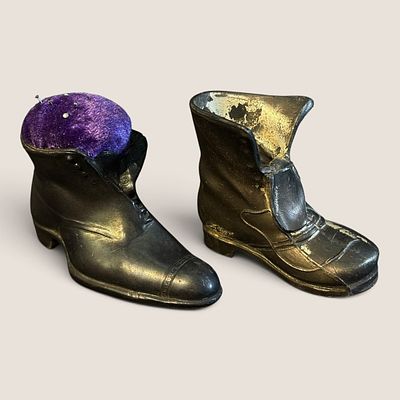 A Pair of Antique Cast Metal Victorian Boot Novelty Desk Accessories. A pair of antique cast 