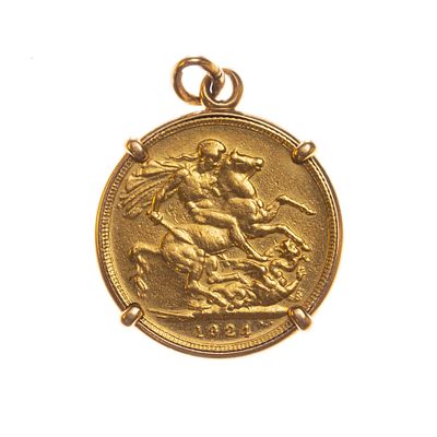 Prendedor en oro 18 K con una libra en oro - Prendedor en oro 18 K amarillo con moneda brit&aacute;nica 